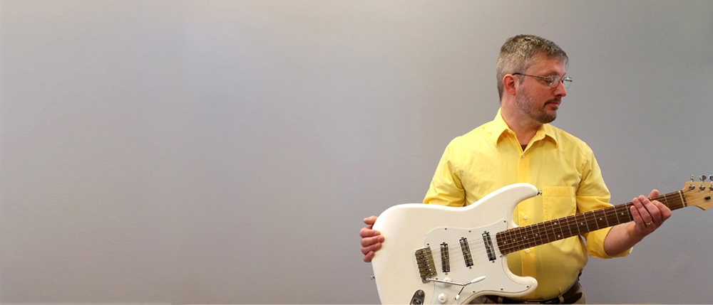 Second - Dave Dick with electric guitar